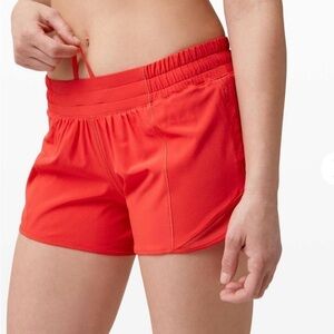 Lululemon sz 6 Hotty Hot Short II *Long 4" Carnation Red, great pre owned cond